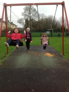 Zoe and Isabel Swining in the Park